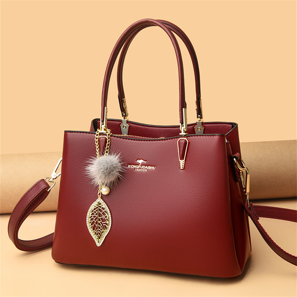 Burgundy charm-accent square handbag · BG-MS-2116162835