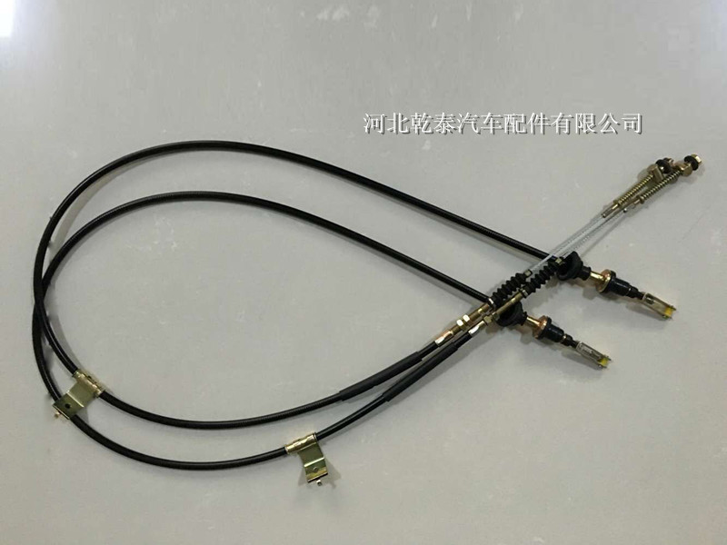 Branched clutch cable with clamp locators · QP-060