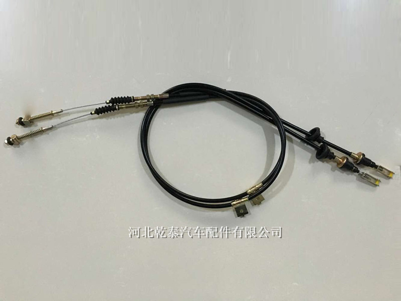 Branched clutch cable with spring-loaded end · QP-059
