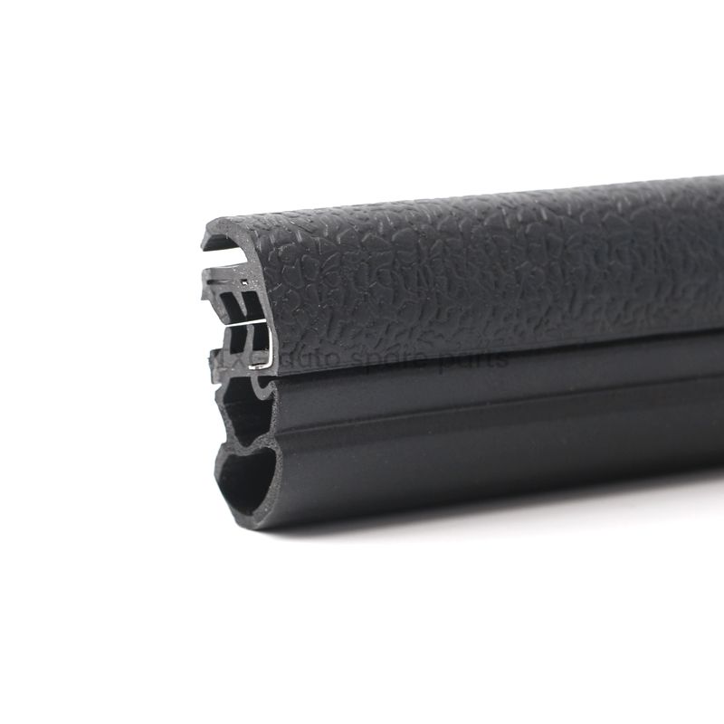 Vehicle door edge seal with elongated twin chambers · QP-047