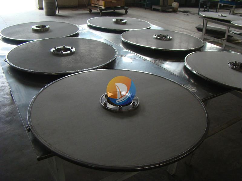 Sintered filter plate with central port · AP-037