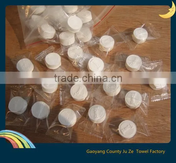 Coin-compressed rayon nonwoven towel · GY-083