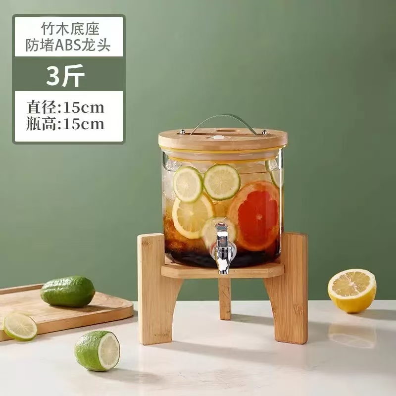 Cylindrical glass beverage dispenser with tap · HJ-040