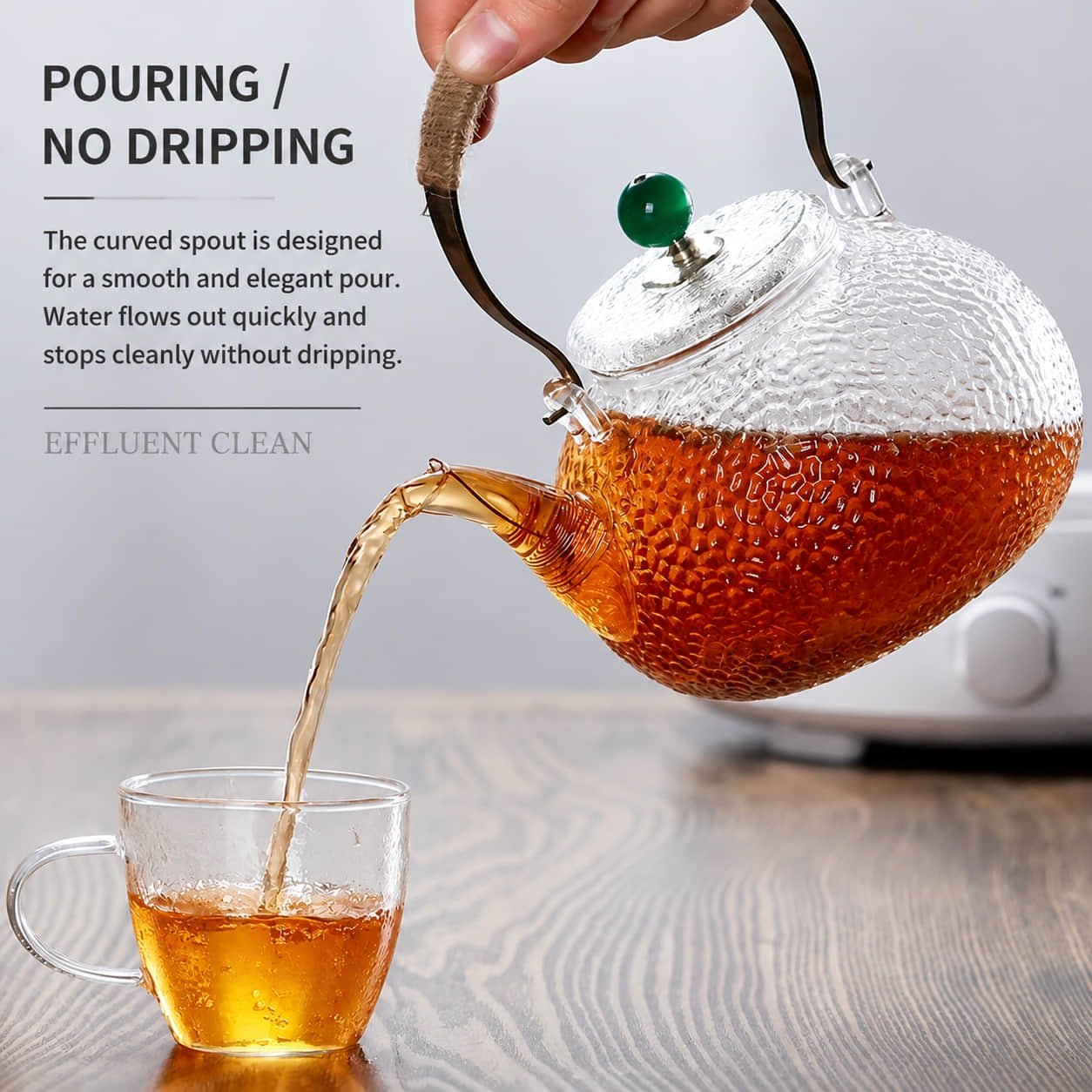 Hammer-textured round glass teapot with overhead handle · HJ-076