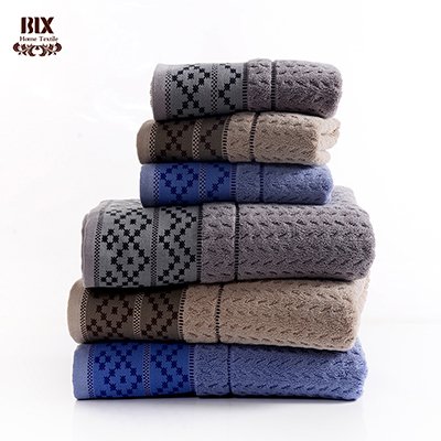 Cotton towel with herringbone pile and diamond border · GY-049