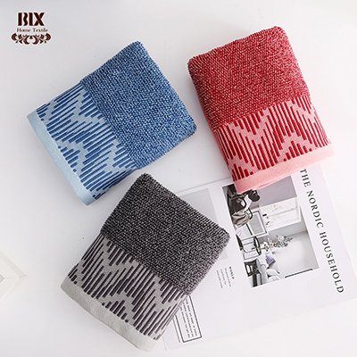 Melange cotton towel with jagged woven end band · GY-040