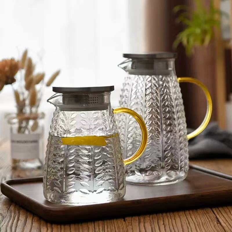 Glass pitcher with leaf-relief body · HJ-031