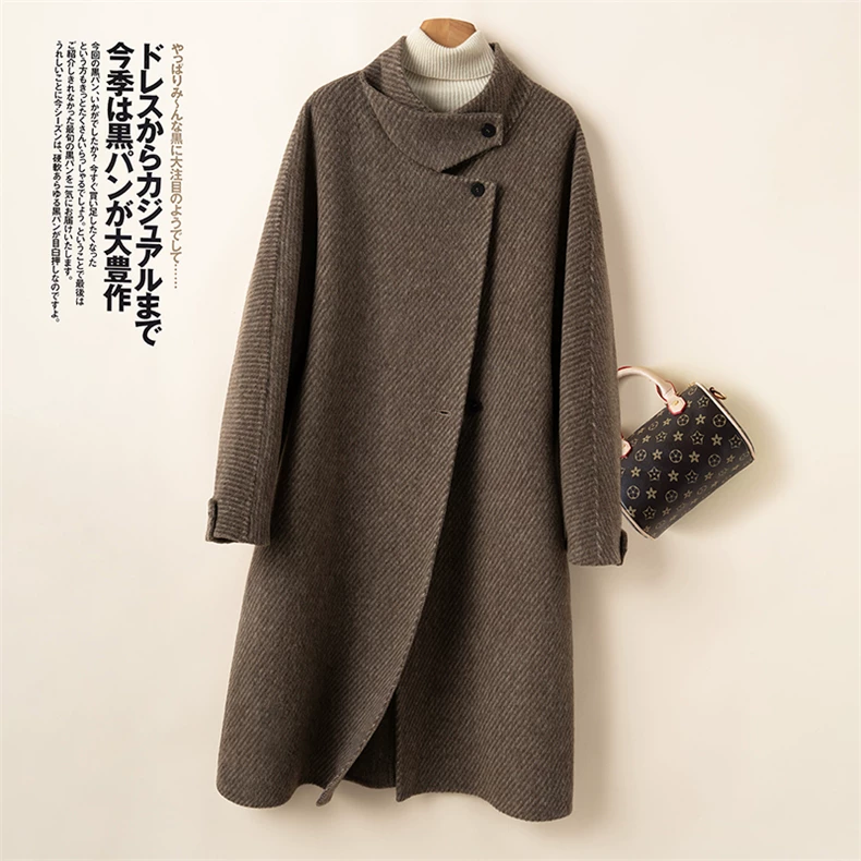 Long coat with offset high collar and curved front hem · QH-028