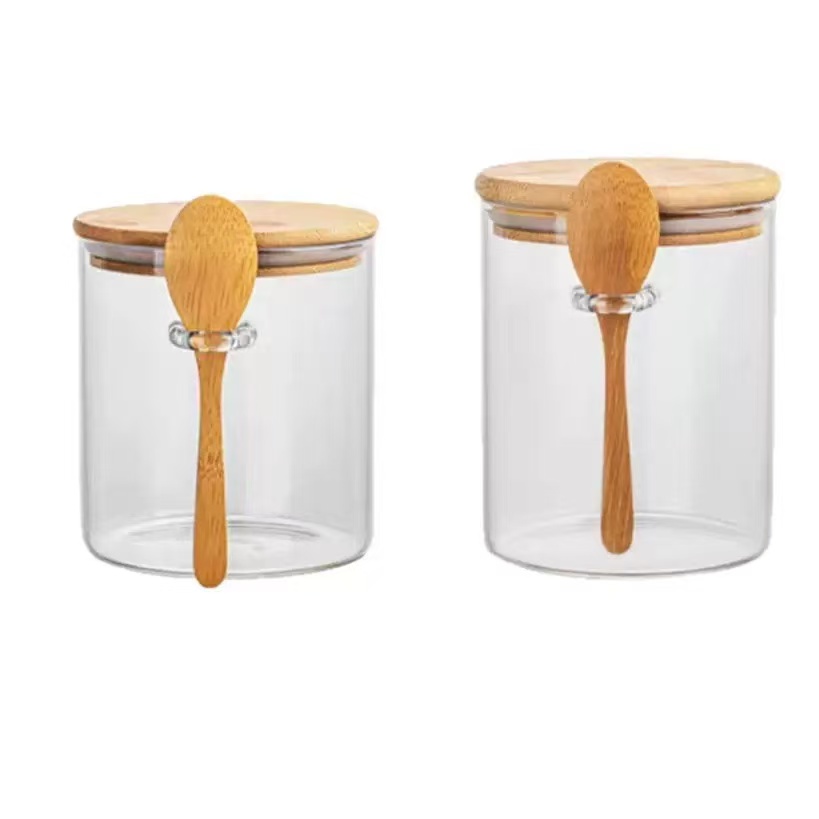 Cylindrical glass jar with external spoon holder · HJ-064