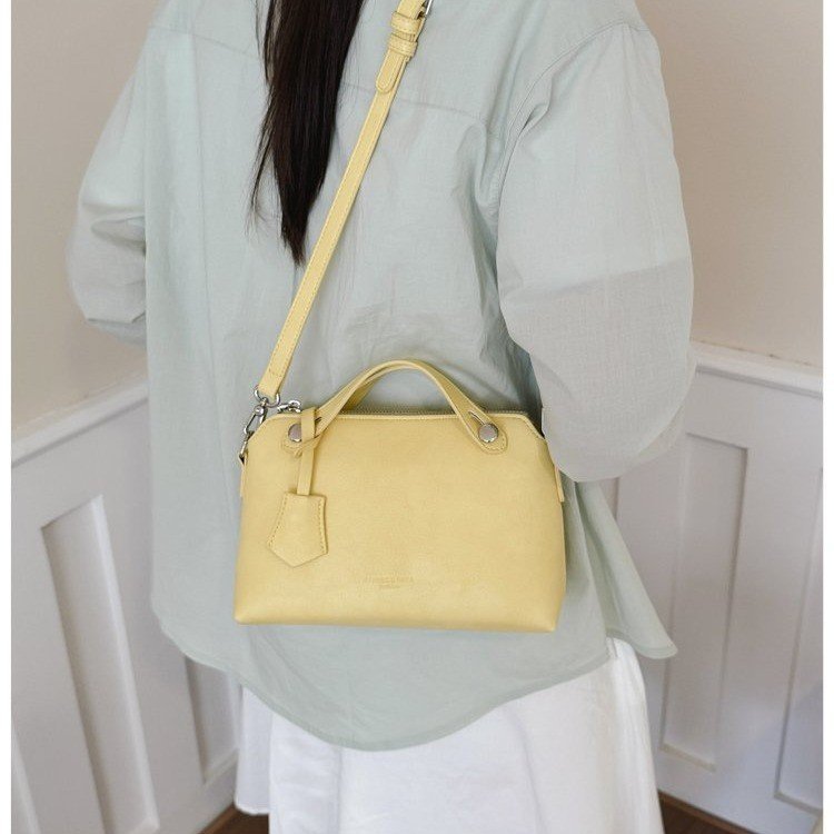 Arched-top mini bowling handbag · BG-038