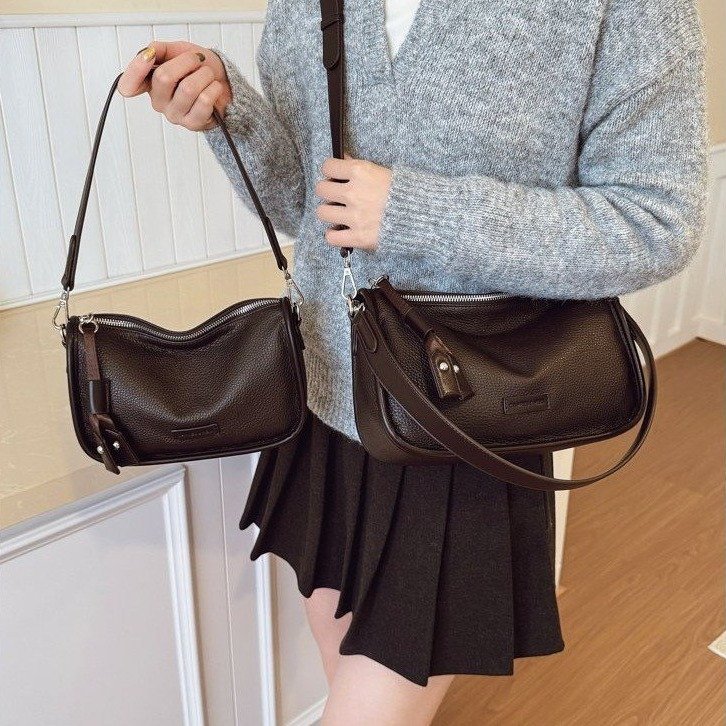 Curved-opening shoulder bag with broad piping and twin straps · BG-055