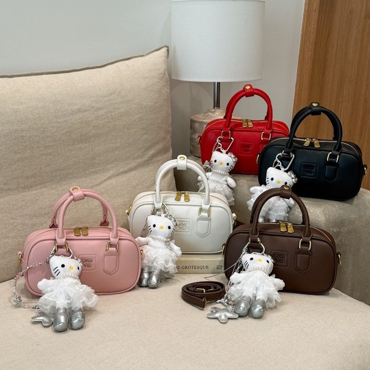 Rounded box bag with external handle tabs · BG-041