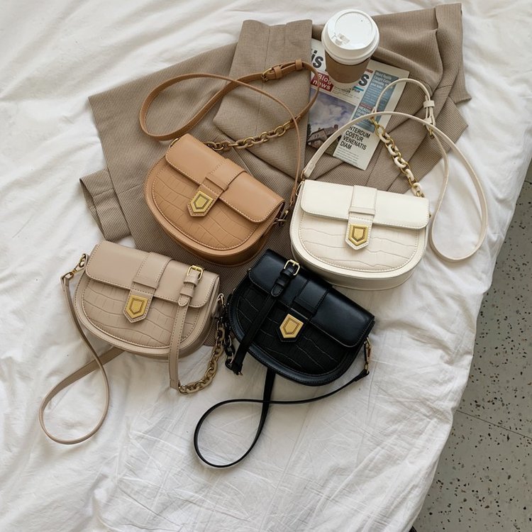 Curved-base crossbody bag with layered flap · BG-058