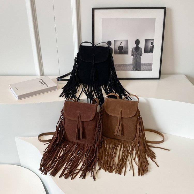 Flap crossbody bag with long fringe · BG-059