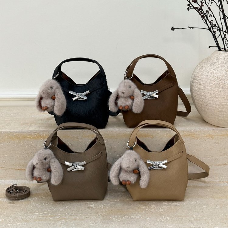 Trapezoid mini bag with arched integrated handle · BG-025