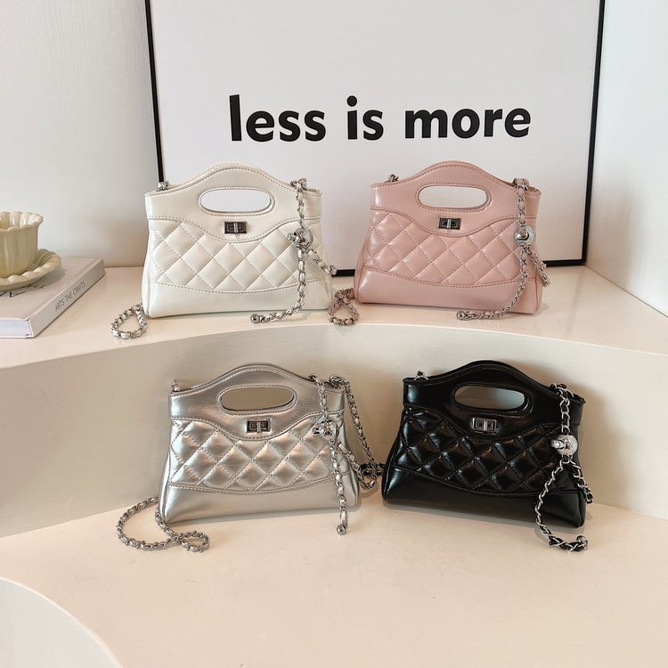 Quilted mini bag with cutout handle and chain · BG-024