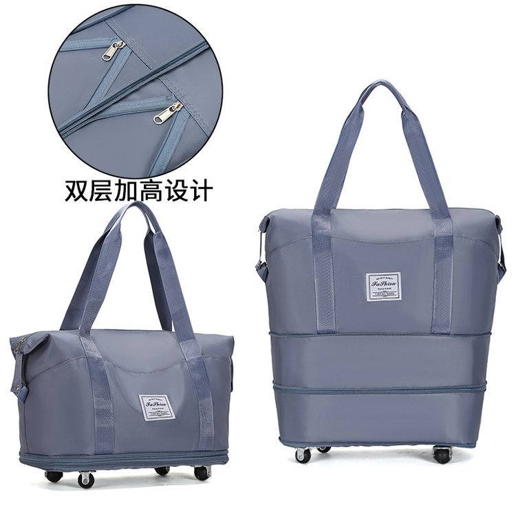 Wheeled tote with two zip expansion sections · BG-097