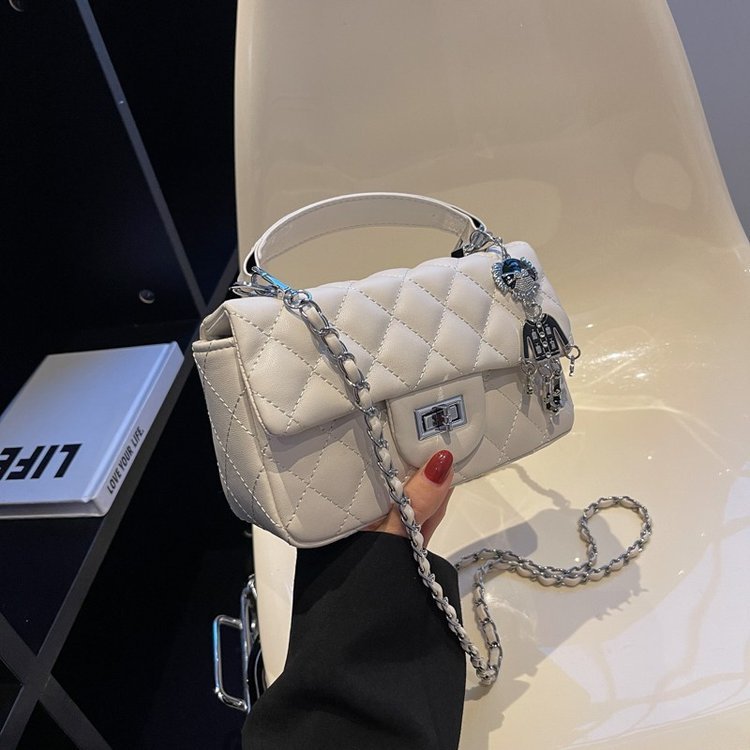 Quilted flap bag with short top handle · BG-026