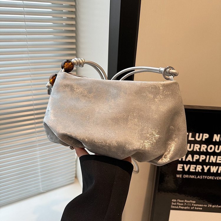 Small frame-top bag with ball clasp · BG-076
