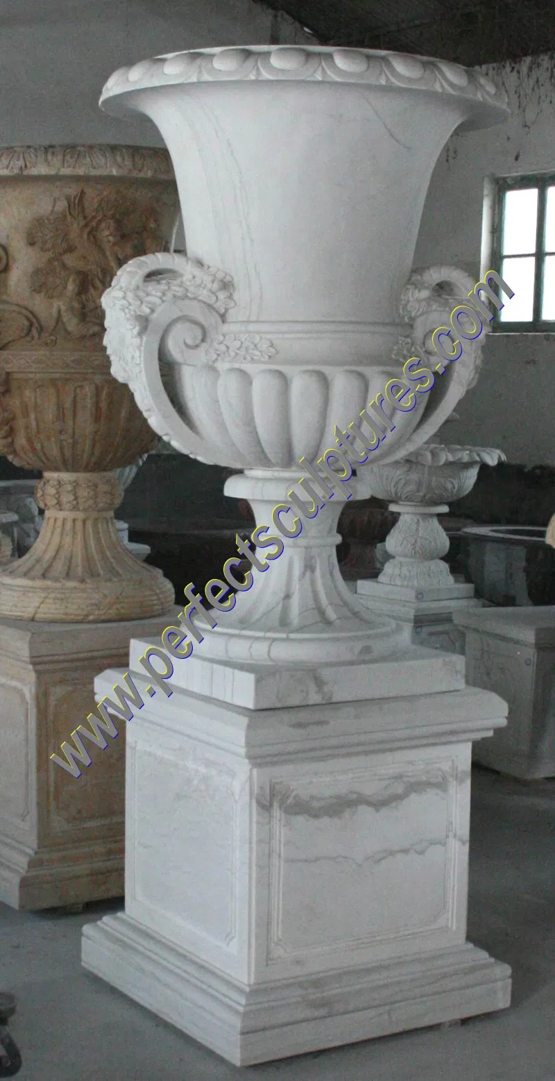 Tall carved pedestal planter · QFP194
