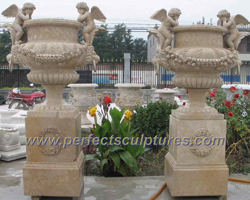 Cherub-carved garden planter · QFP249